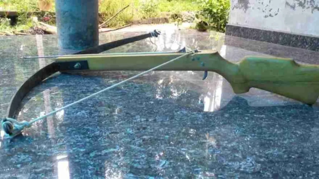 a crossbow on a table
