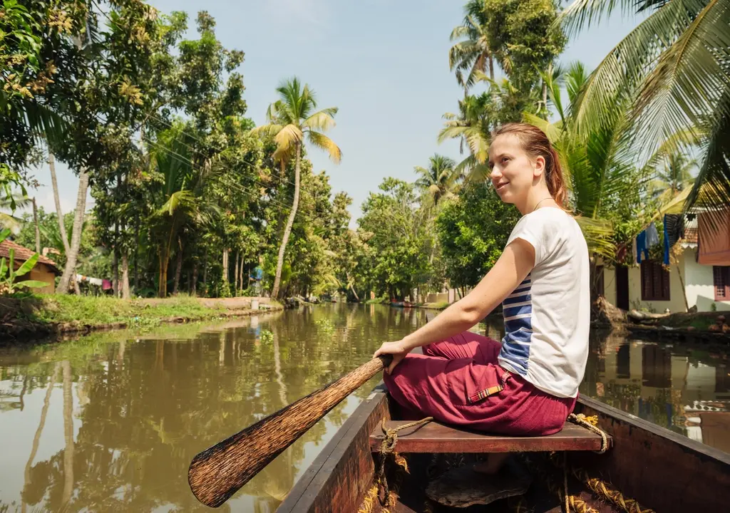 tourist-woman-boating-on-alleppey-backwaters
